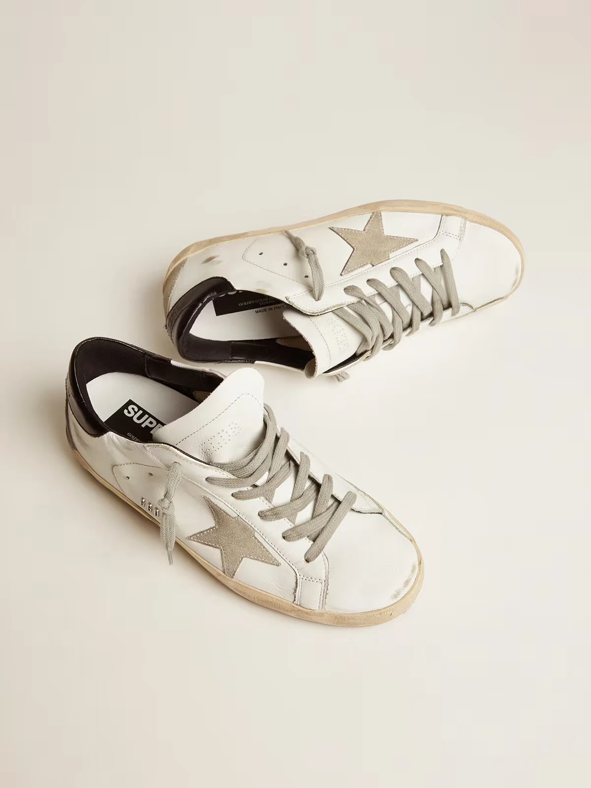 Womens Super Star with black heel tab and metal stud lettering