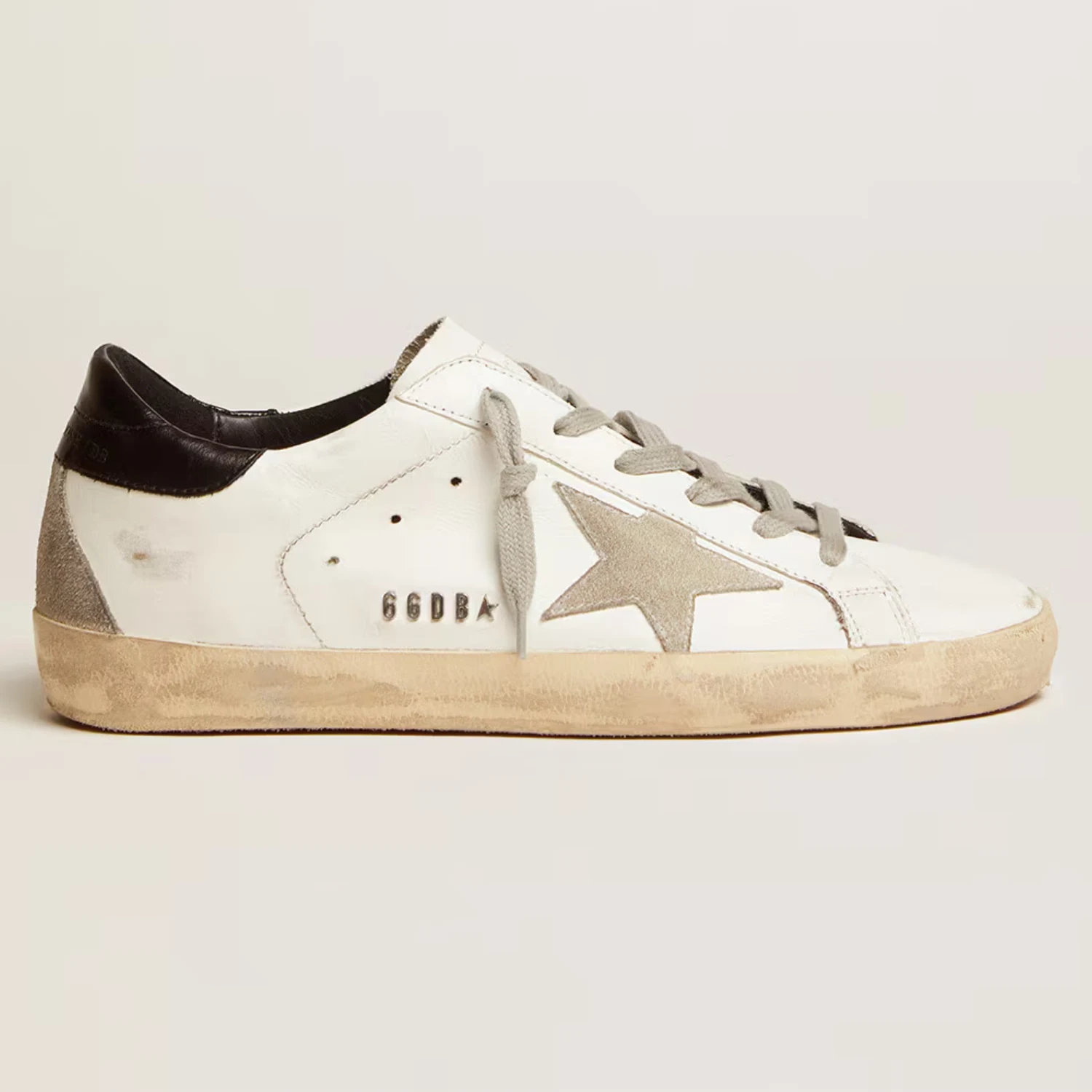 Womens Super Star with black heel tab and metal stud lettering